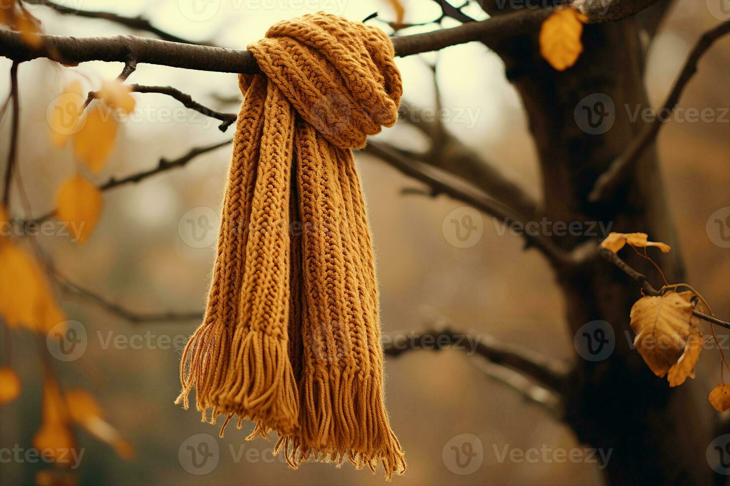 un dorado tejido a mano bufanda hecho de australiano lana, colgando en un árbol rama. símbolo de esperanza y compasión, recordatorio de el amabilidad y generosidad de extraños ai generado. foto