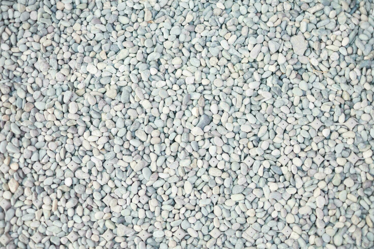White beautiful closeup small many rough shiny texture pebble rocks background, quartz ground design for jewelry luxury decoration wall collection treasure construction, hard mineral detail granite photo