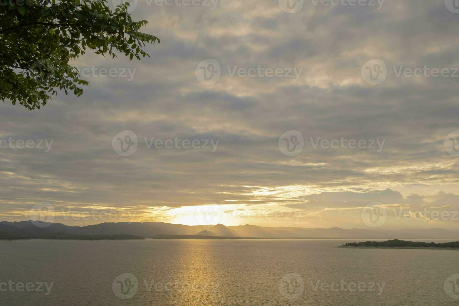 Travel for beautiful nature lake sunset, Relax vacation with landscape sky and evening sunlight, Calm outdoor holiday water reflection with cloud view background, peaceful calm horizon mountain photo