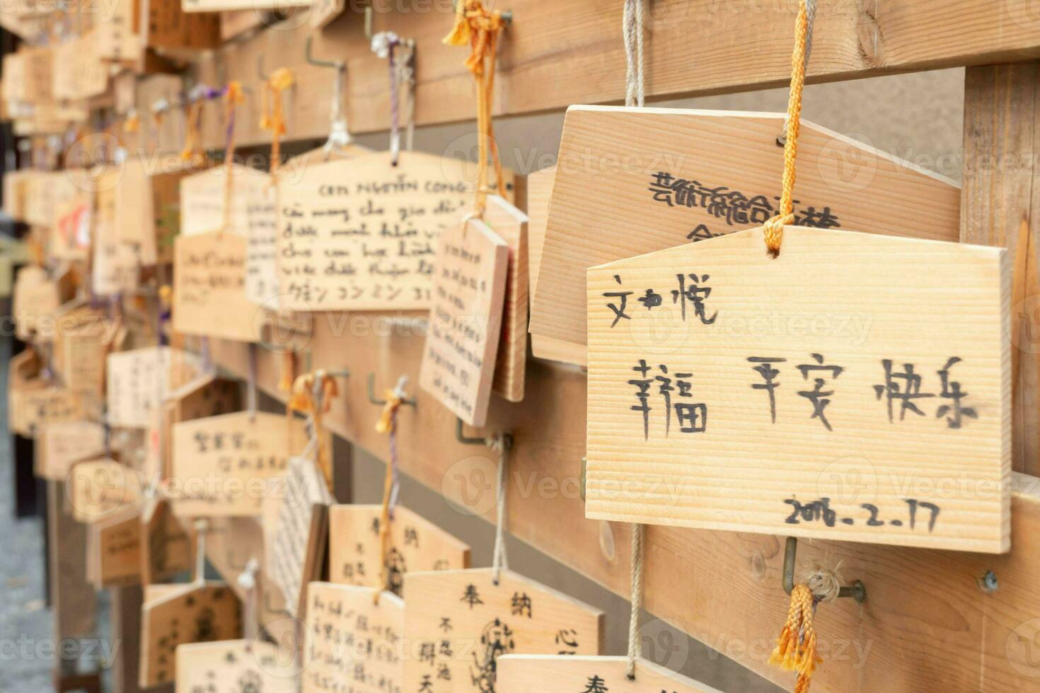 White paper tie knot in Tokyo and Kyoto Japan shrine temple tourism wish and pray for luck, symbol of faith and fortune spiritual Asia Buddhism culture tradition hope for good chance future destiny photo