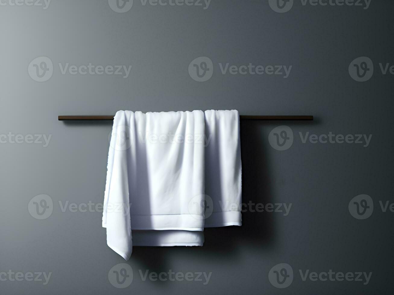 Clean white towel on a hanger photo