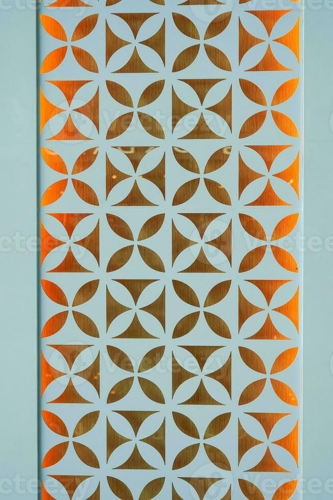 Pattern with floral and geometric elements. The intersection of thick curved and straight lines form an abstract floral ornament, kawung batik, background for design. Seamless decorative photo