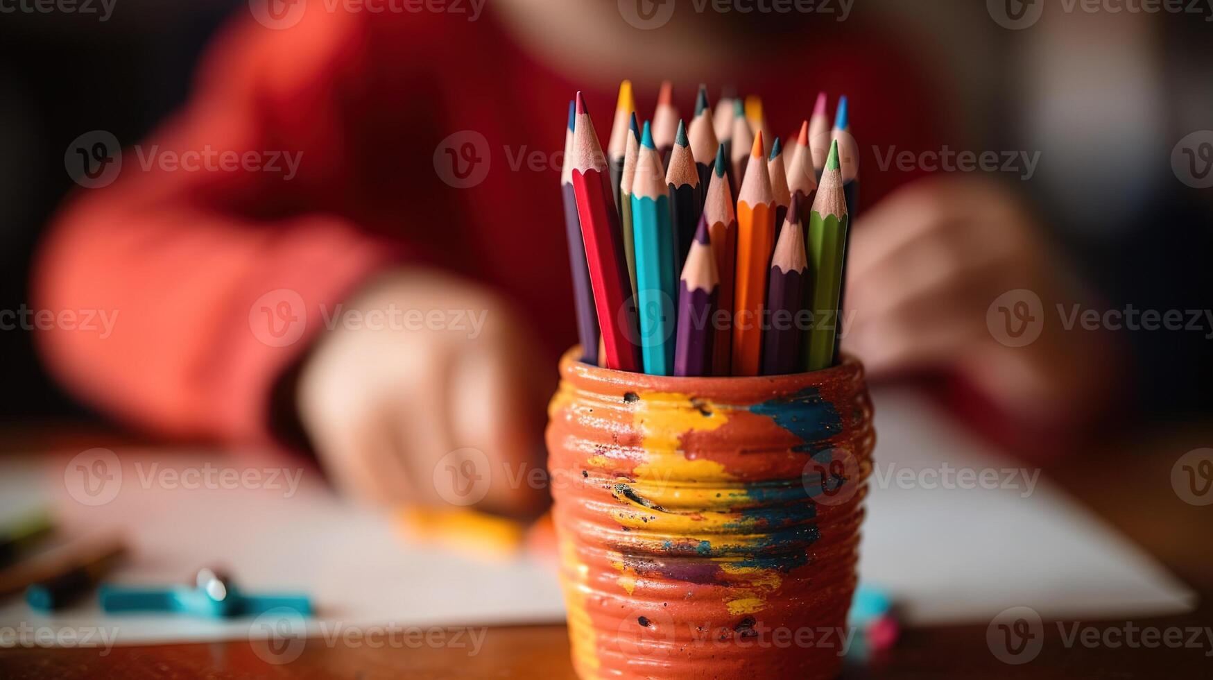 a child is drawing with colored crayons in a pencil holder AI Generative photo