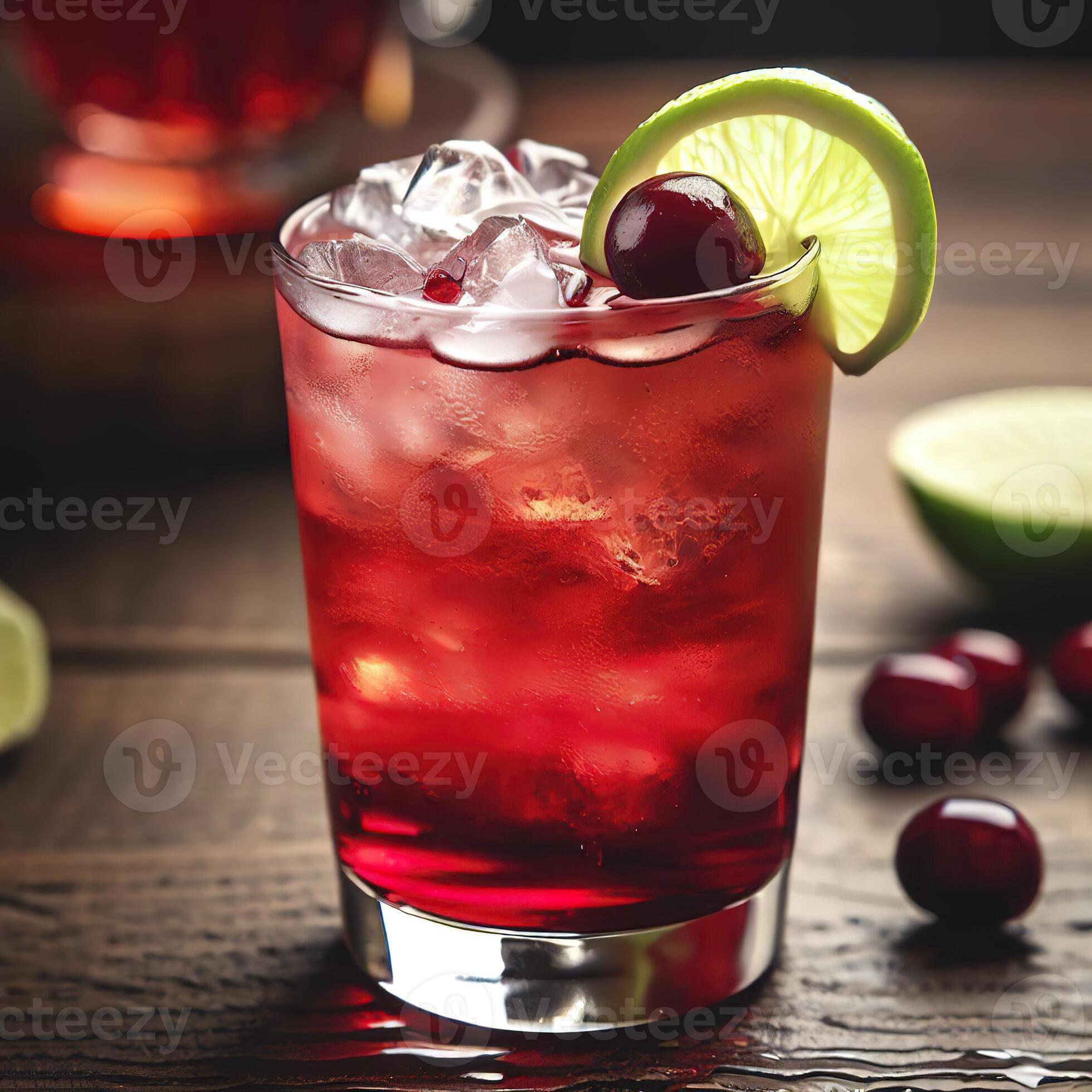 Cape Codder cocktail with vodka, cranberry juice and lime on wooden