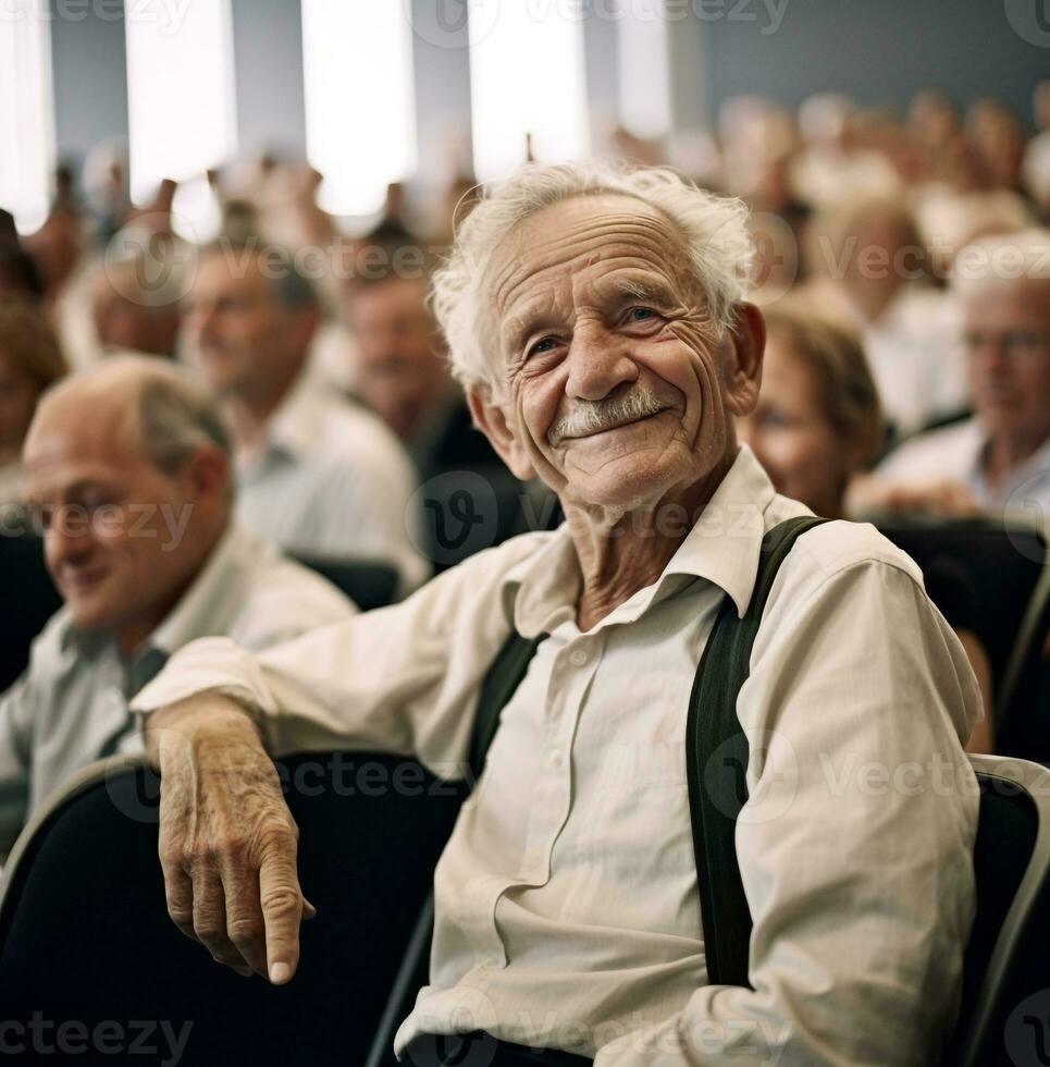 An elderly man posing and smiling at a conference, boss day images photo