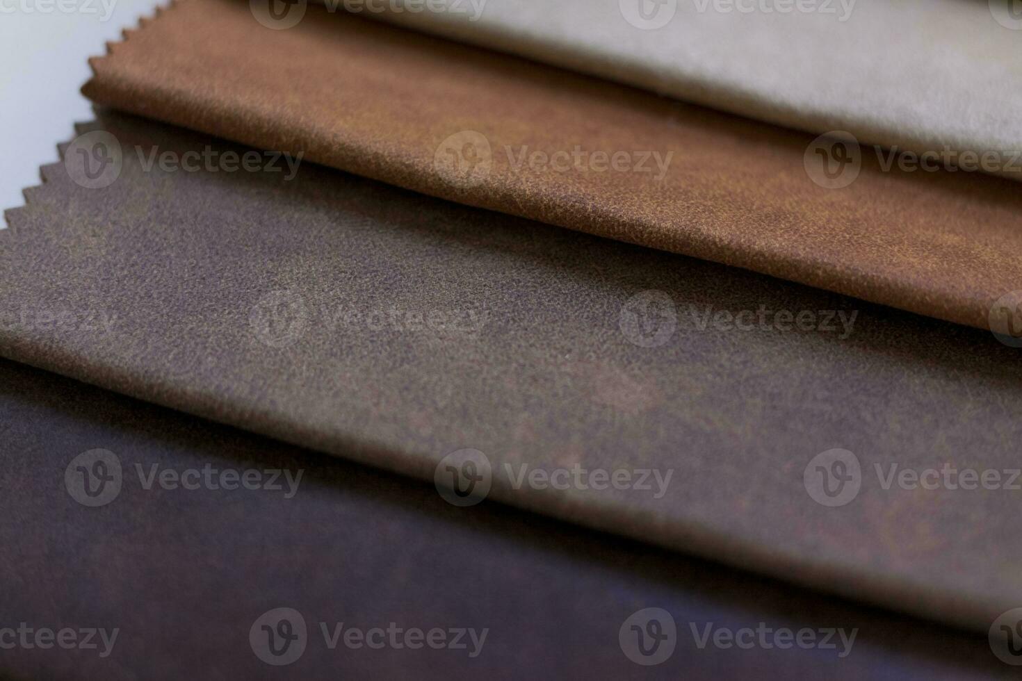 Backgrounds made of natural and artificial fabrics for the decoration of textiles, furniture and clothing on a beige background. Furniture production. wallpaper with space for copying text. photo