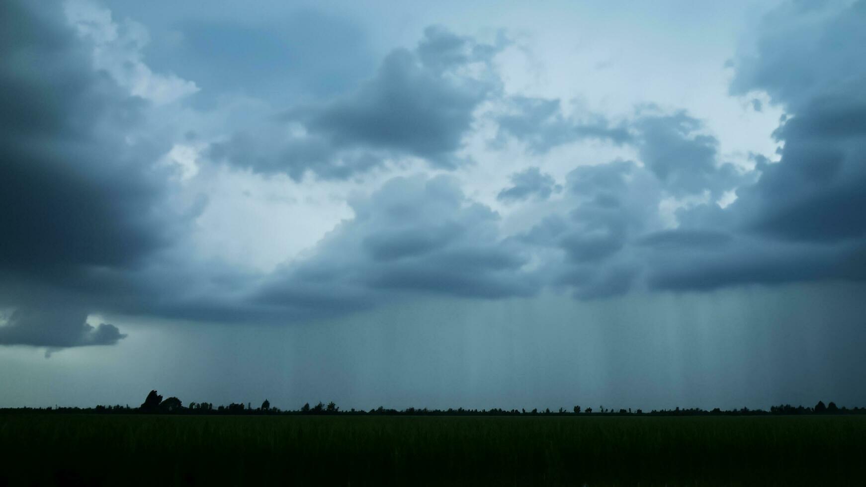 Rain clouds and black sky textured background Panoramic shot of rain clouds in the distance rain from the sky Black cloud and thunder storm Dark sky and motion clouds before rainy 3d illustration photo