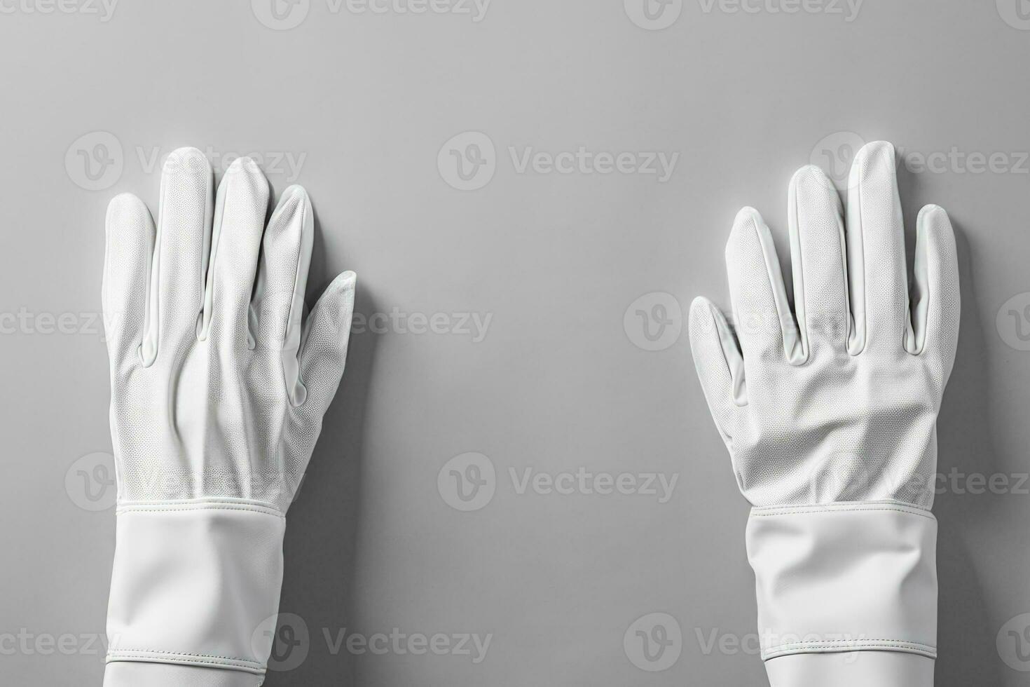 Assortment of cleaning gloves in mono tone setting background with empty space for text photo