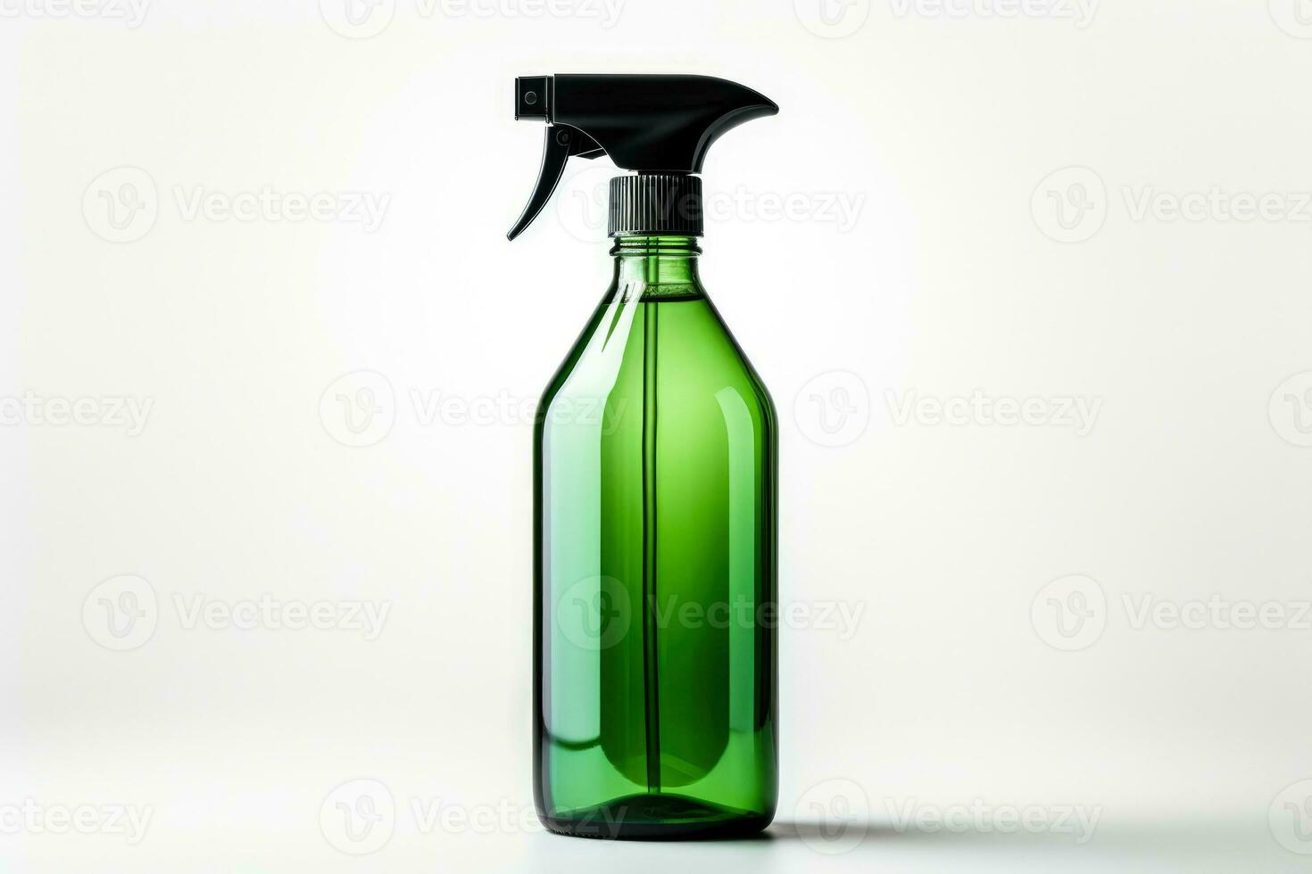 Simple glass spray bottle with natural cleaning solution isolated on a white background photo