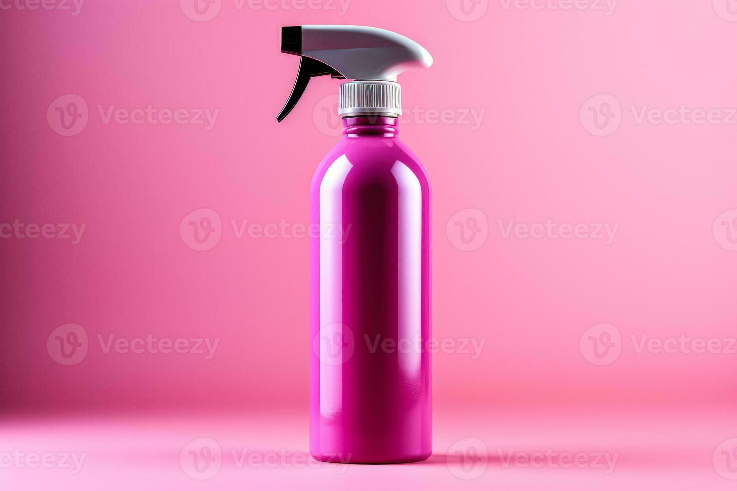 A vibrant disinfectant spray bottle isolated on a pink gradient background photo