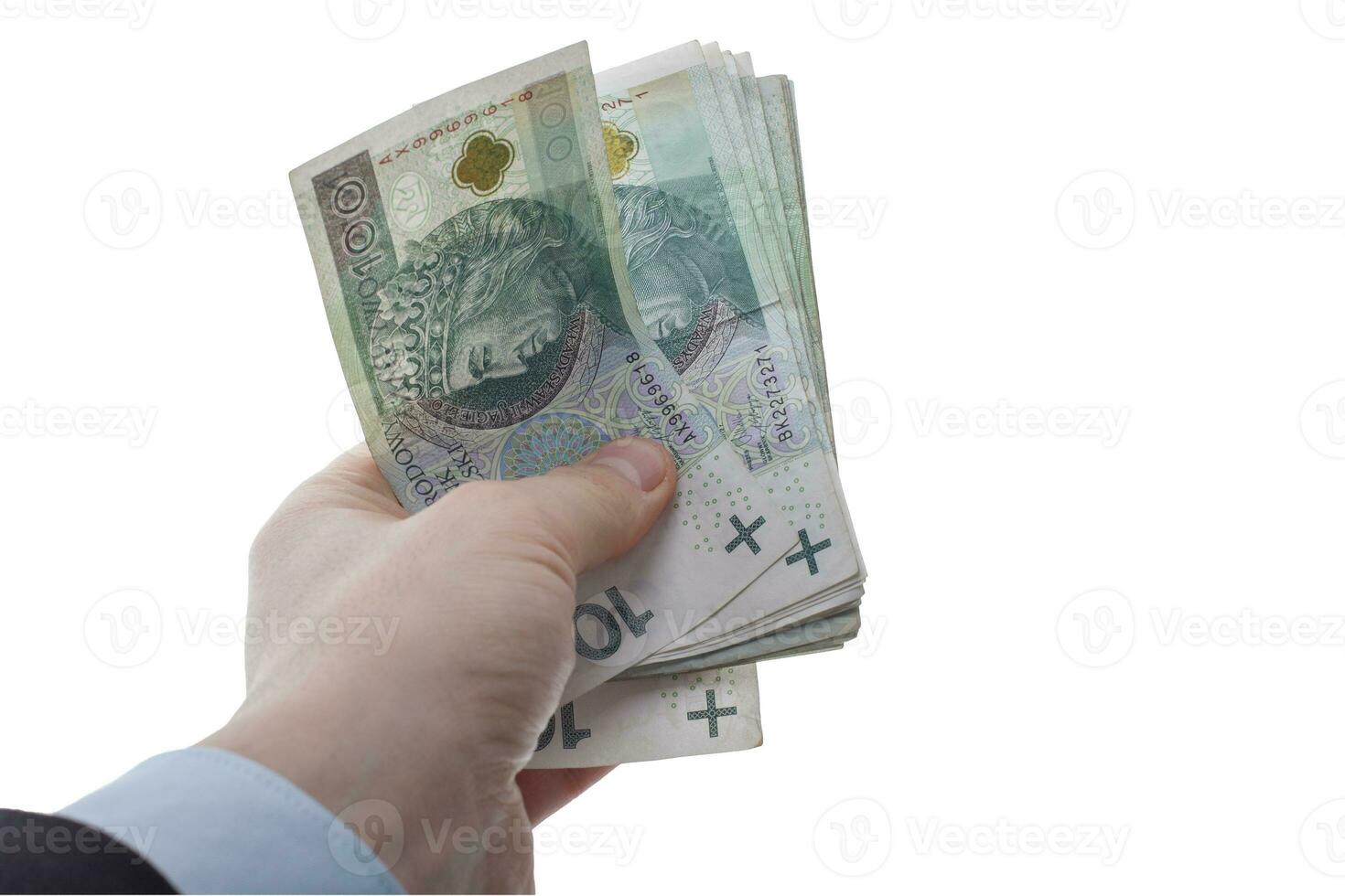 Hand Displaying Polish 100 Banknotes on White Background photo