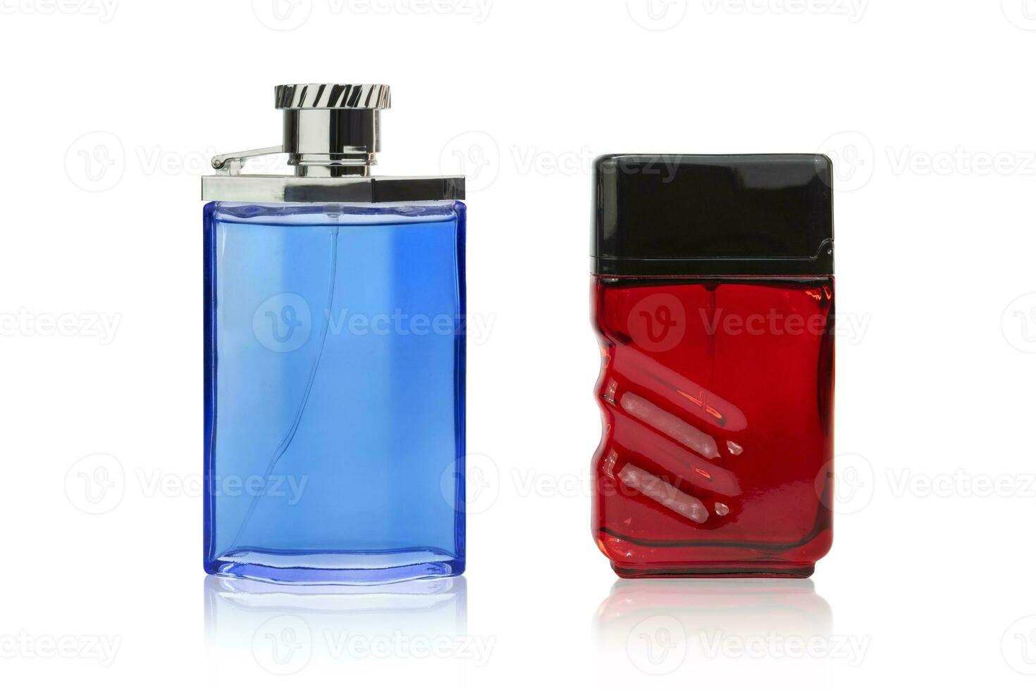 Red and blue perfume bottles on isolated white background photo