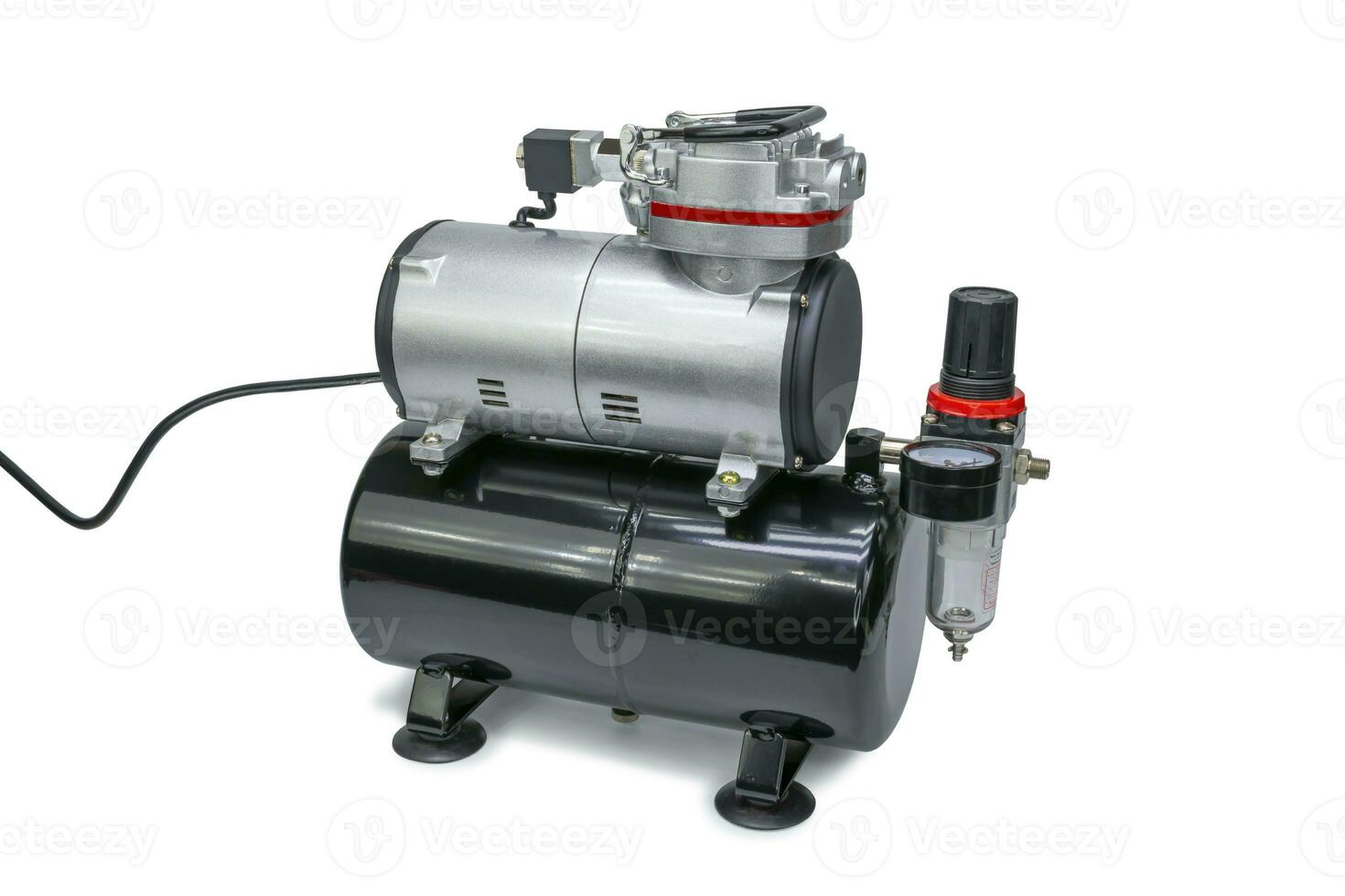 Mini air compressor on isolated white background photo