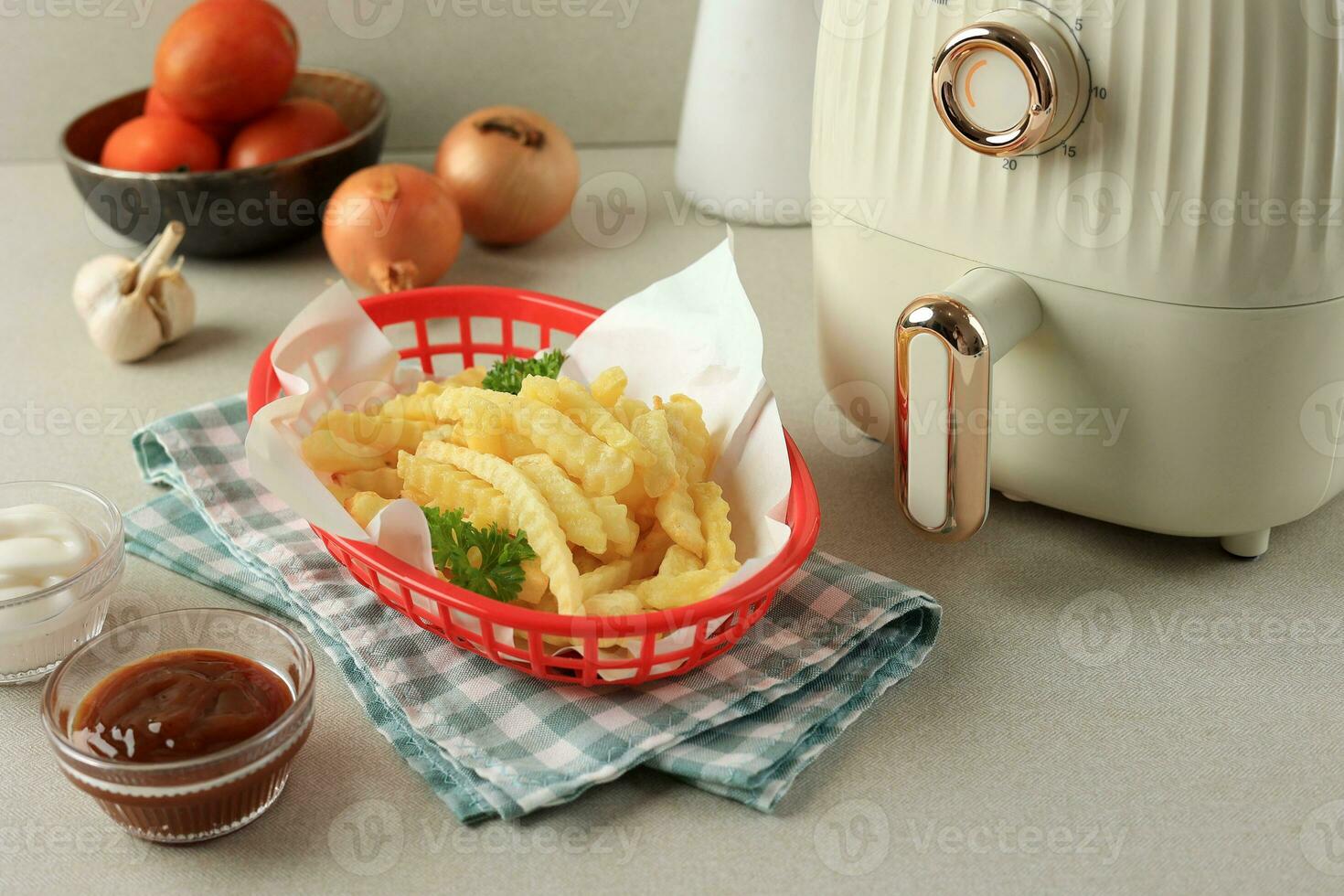 Crinkle Cut French Fries in a Red Basket photo