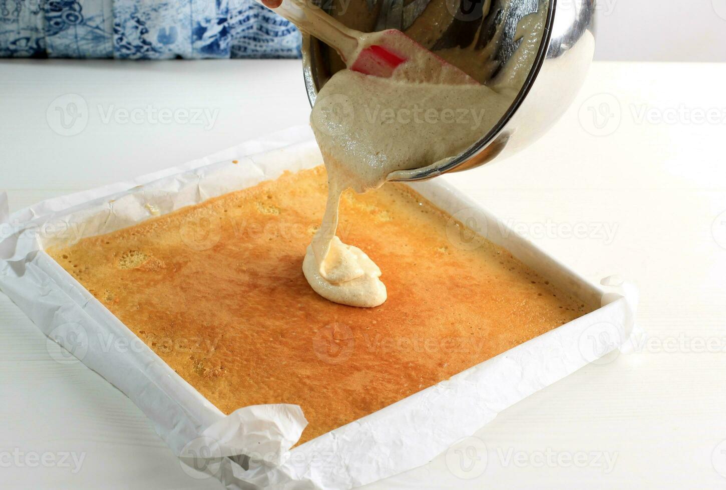 Pour Batter to the Pan with Fresh Baked Layer Cake photo