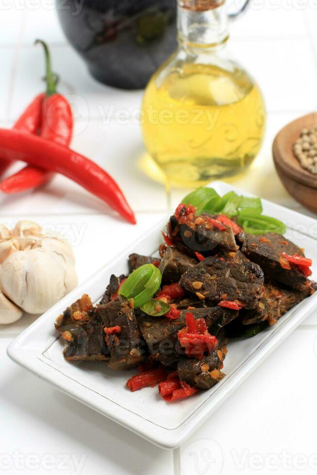 Fried Lung with Spicy Red Sauce or Paru Goreng Balado photo