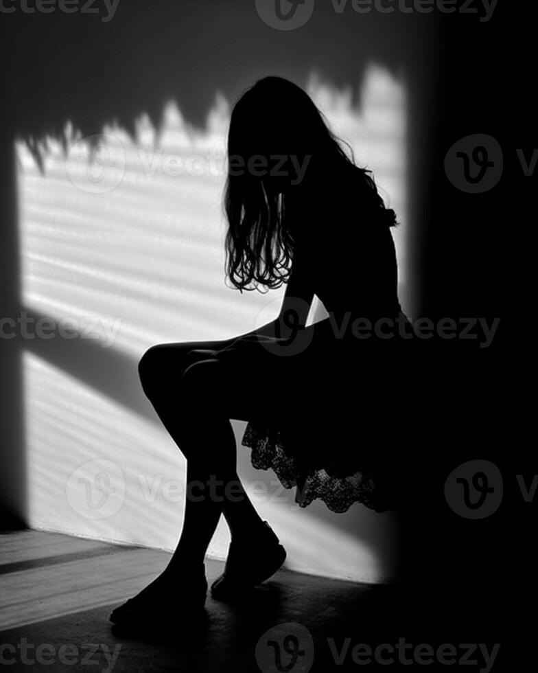 sad woman sitting silhouette