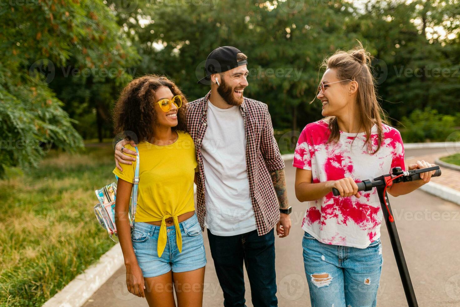 happy young company of friends having fun in park photo