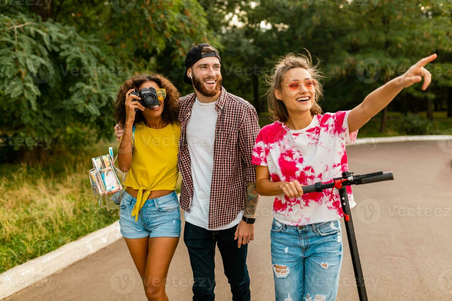 happy young company of friends having fun in park photo