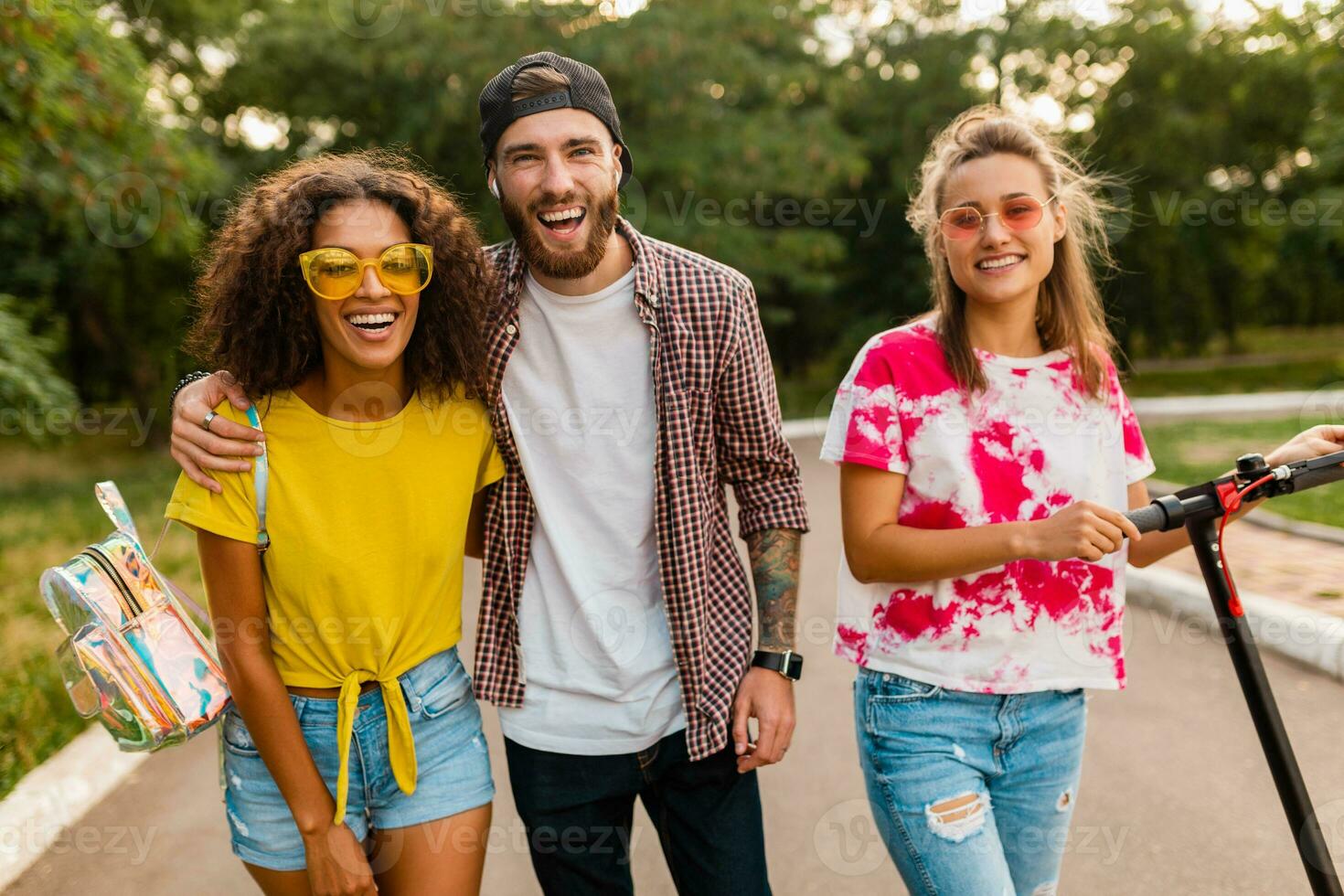 happy young company of friends having fun in park photo