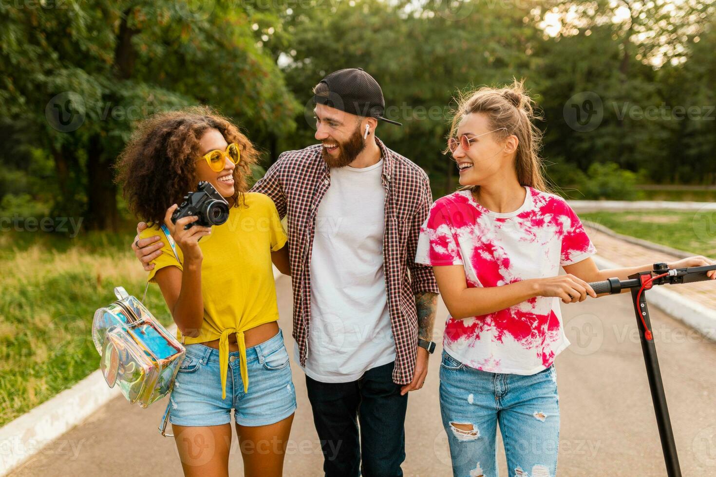 happy young company of friends having fun in park photo