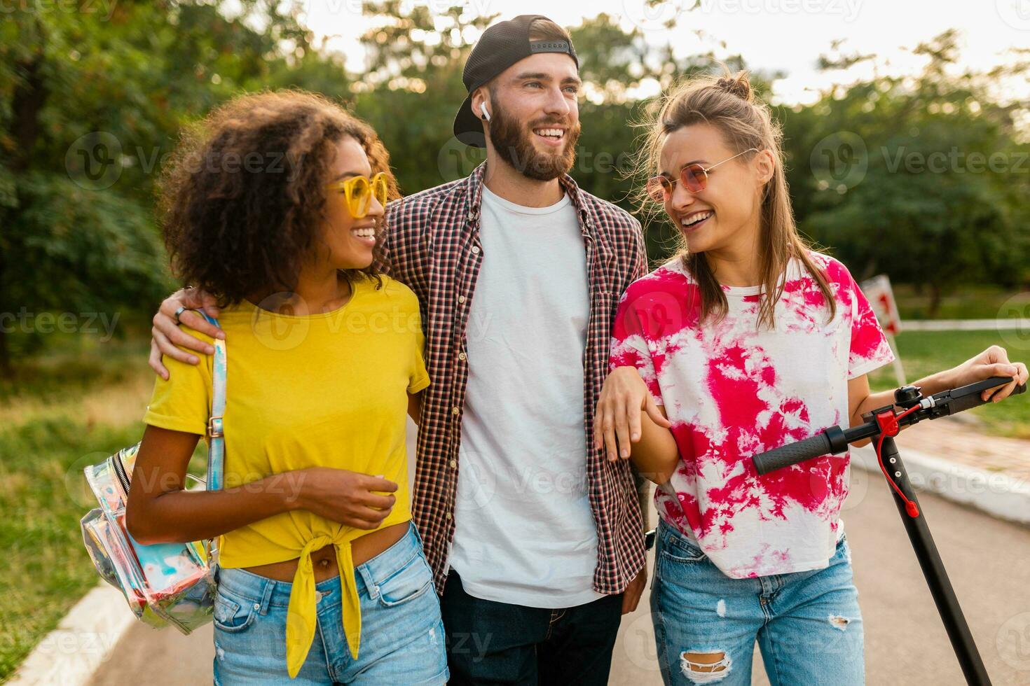 happy young company of friends having fun in park photo