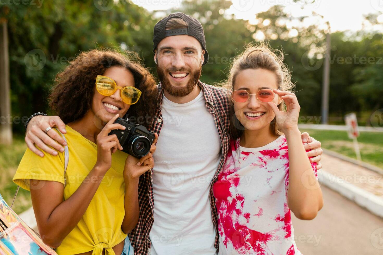 happy young company of friends having fun in park photo