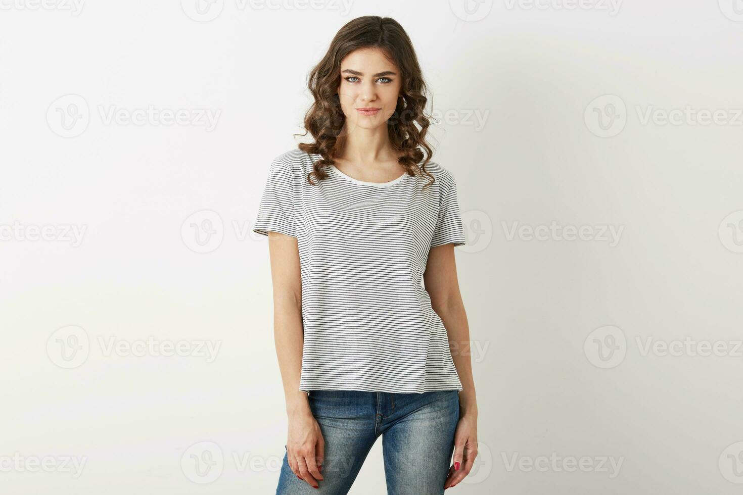 pretty young woman, hipster style, dressed in jeans, t-shirt, isolated on white background, curly hair photo