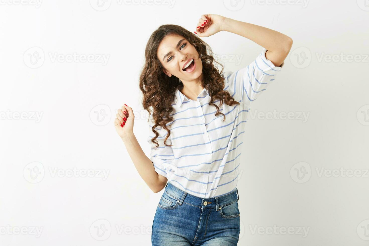 cheerful portrait of young pretty woman dancing happy, smiling face expression, long hair, positive mood, emotional, hipster style outfit, summer fashion trend, jeans and striped shirt, isolated photo