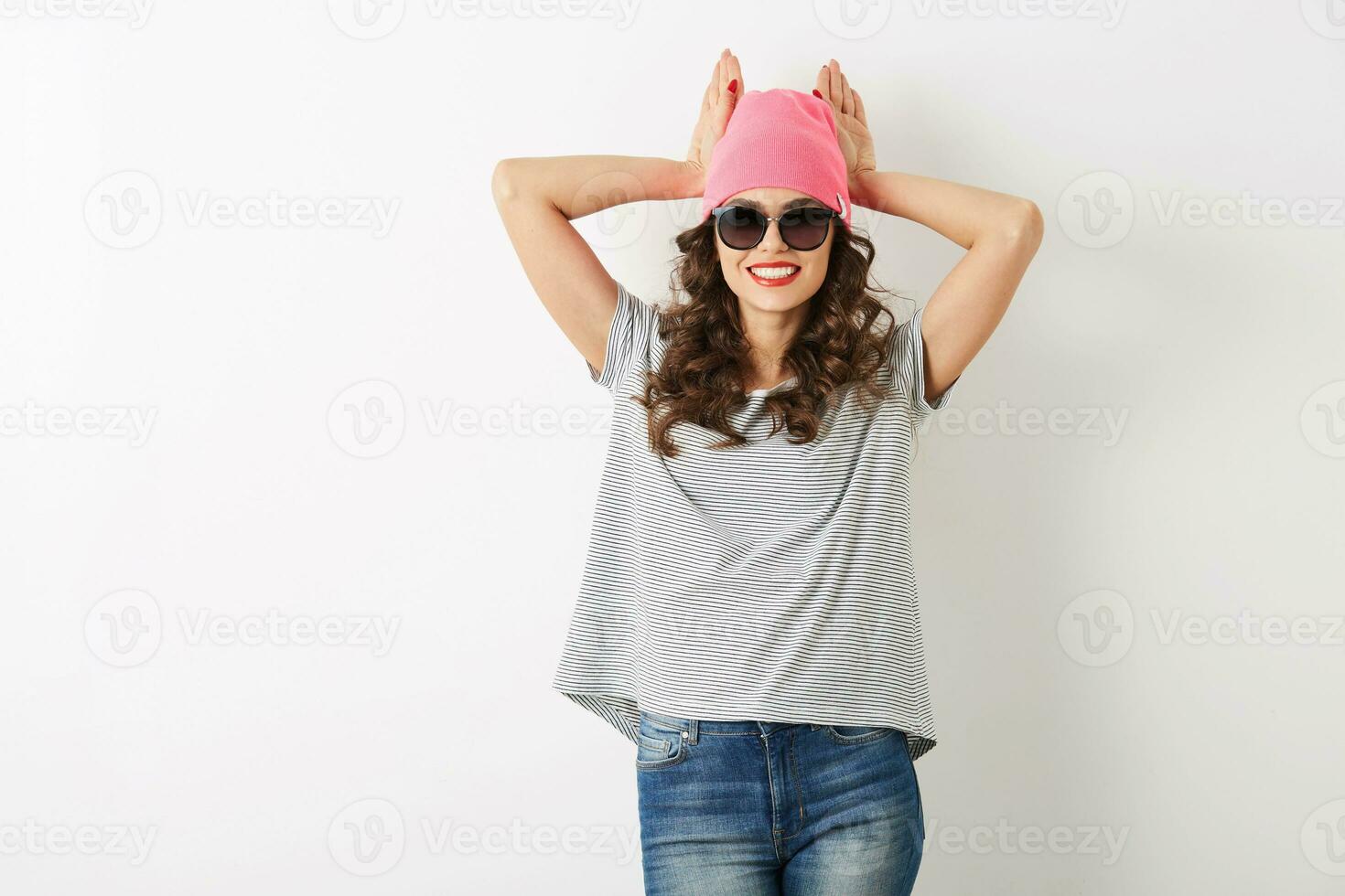 portrait of funny hipster pretty woman in pink hat, sunglasses, smiling, happy mood, isolated, cheerful emotion, spring fashion trend, casual style, t-shirt, trendy apparel photo