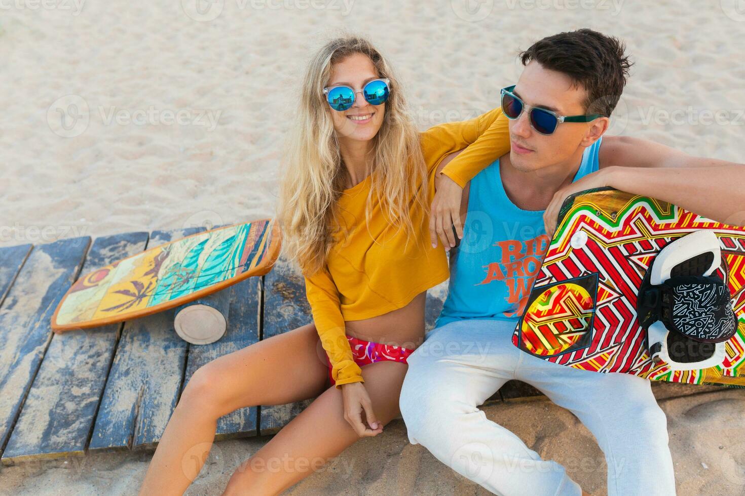 young couple having fun on beach photo