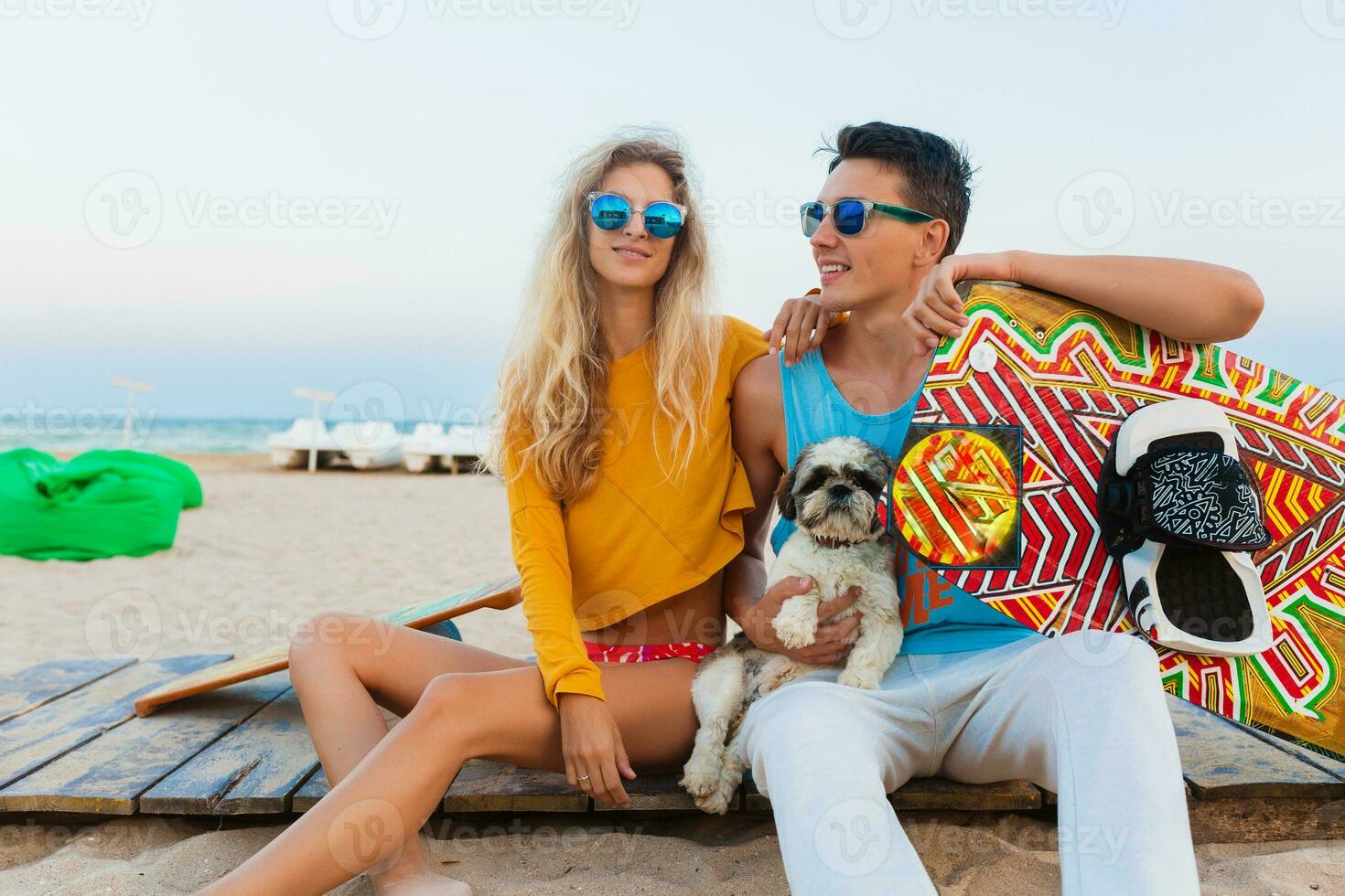 young couple having fun on beach photo