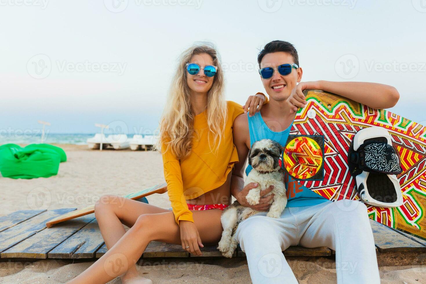 young couple having fun on beach photo
