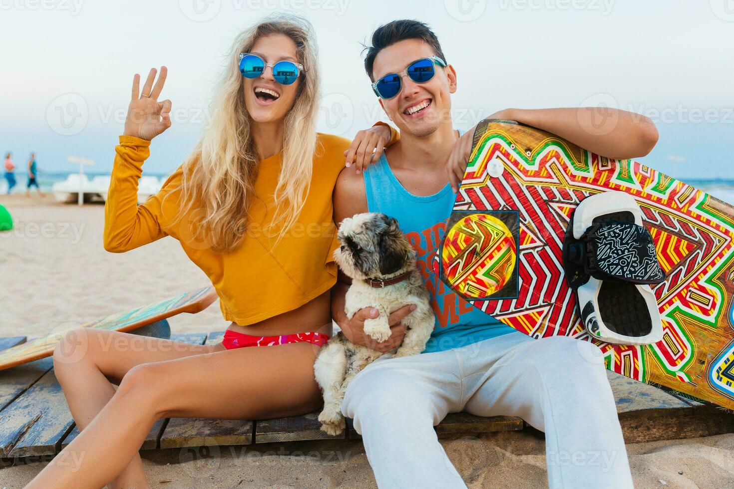 young couple having fun on beach photo