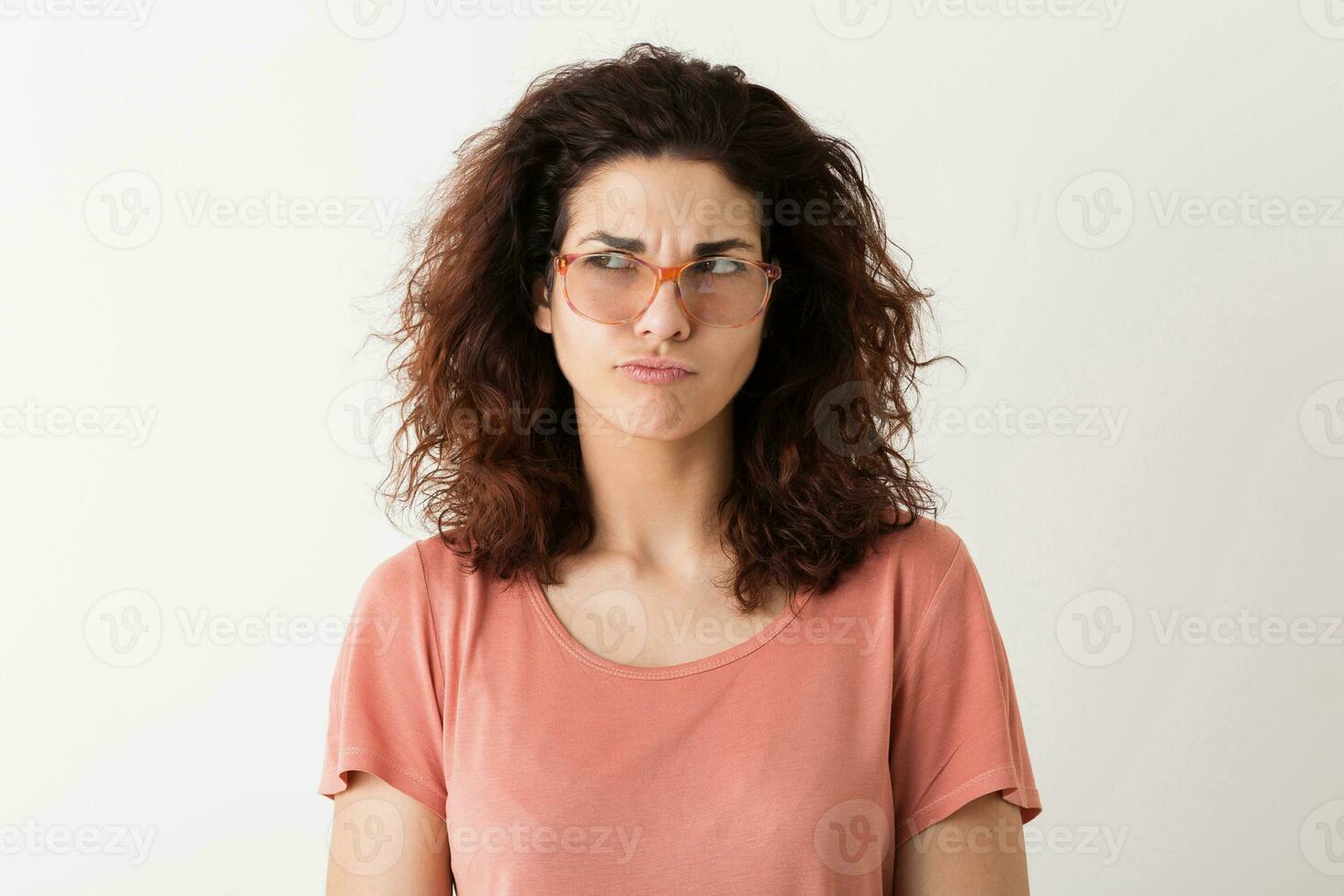 portrait of young natural looking smiling happy hipster pretty woman in pink shirt photo