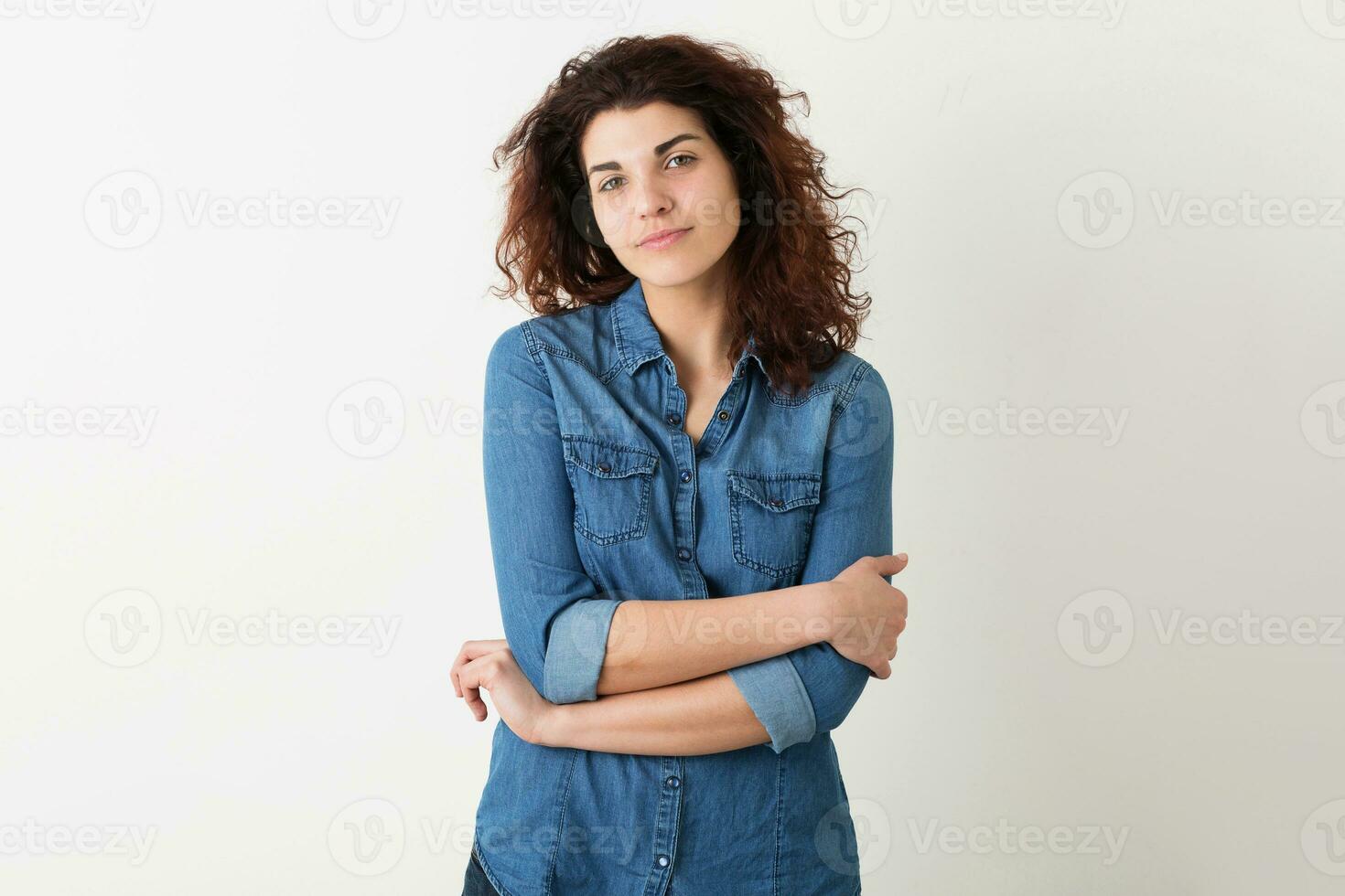 young pretty woman curly hair blue shirt, hipster style photo