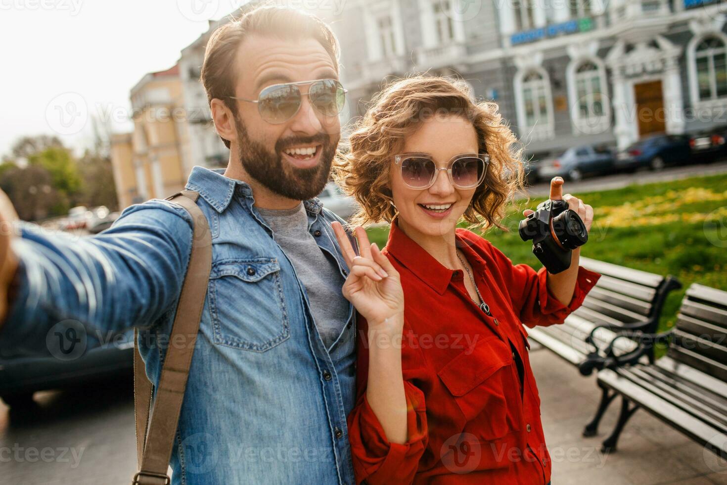 man and woman on romantic vacation walking together photo