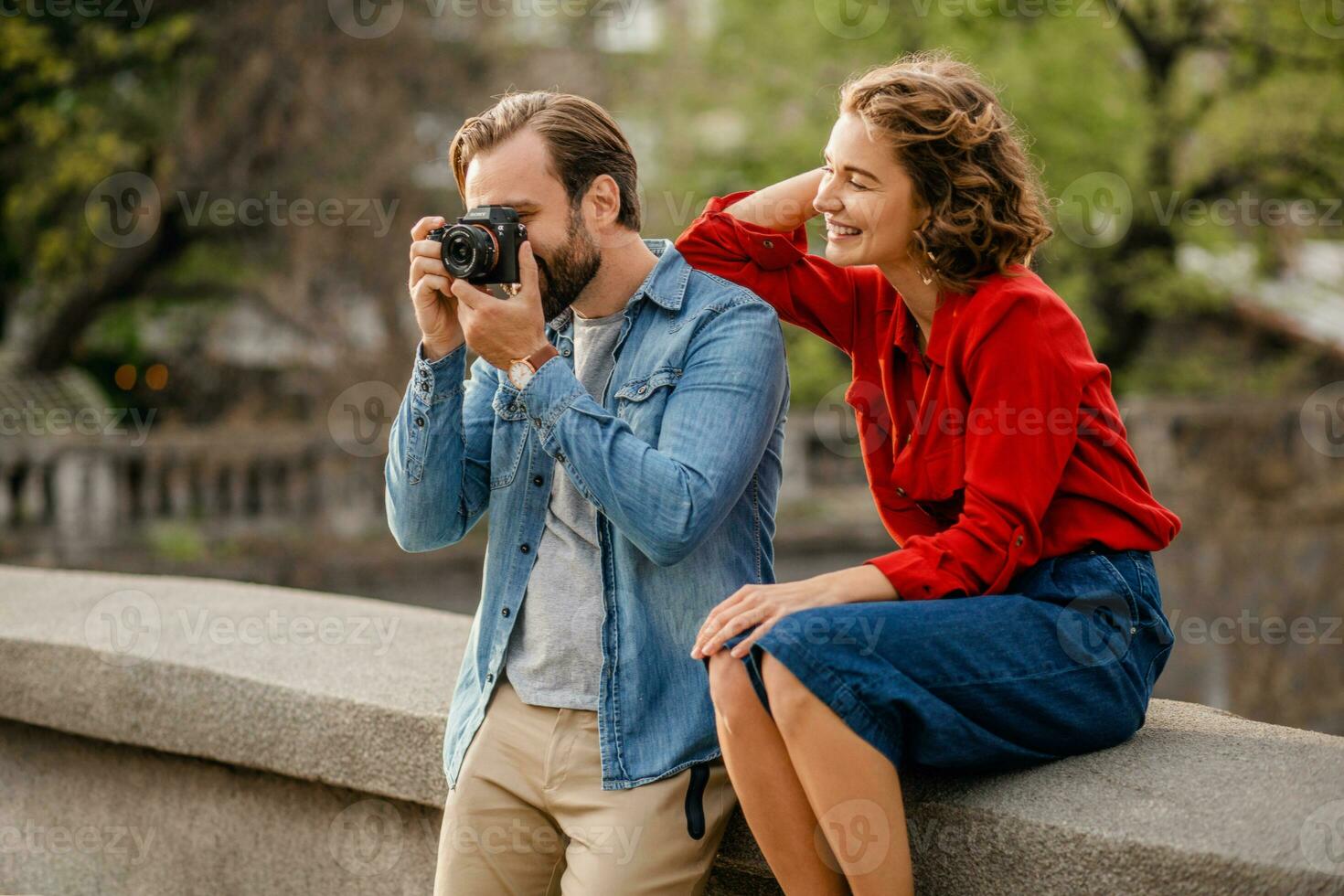 man and woman on romantic vacation walking together photo