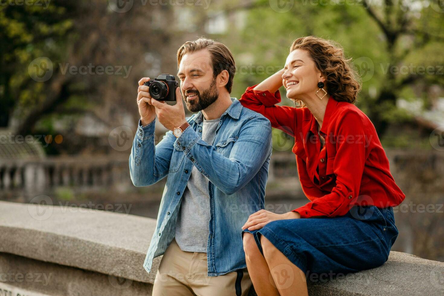 man and woman on romantic vacation walking together photo