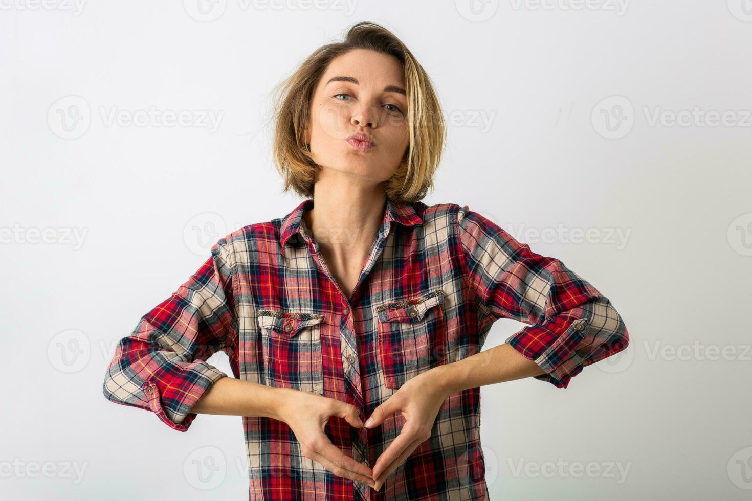 young emotional woman in checkered shirt photo