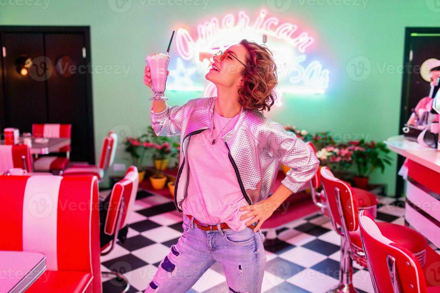 stylish smiling woman in retro vintage cafe photo