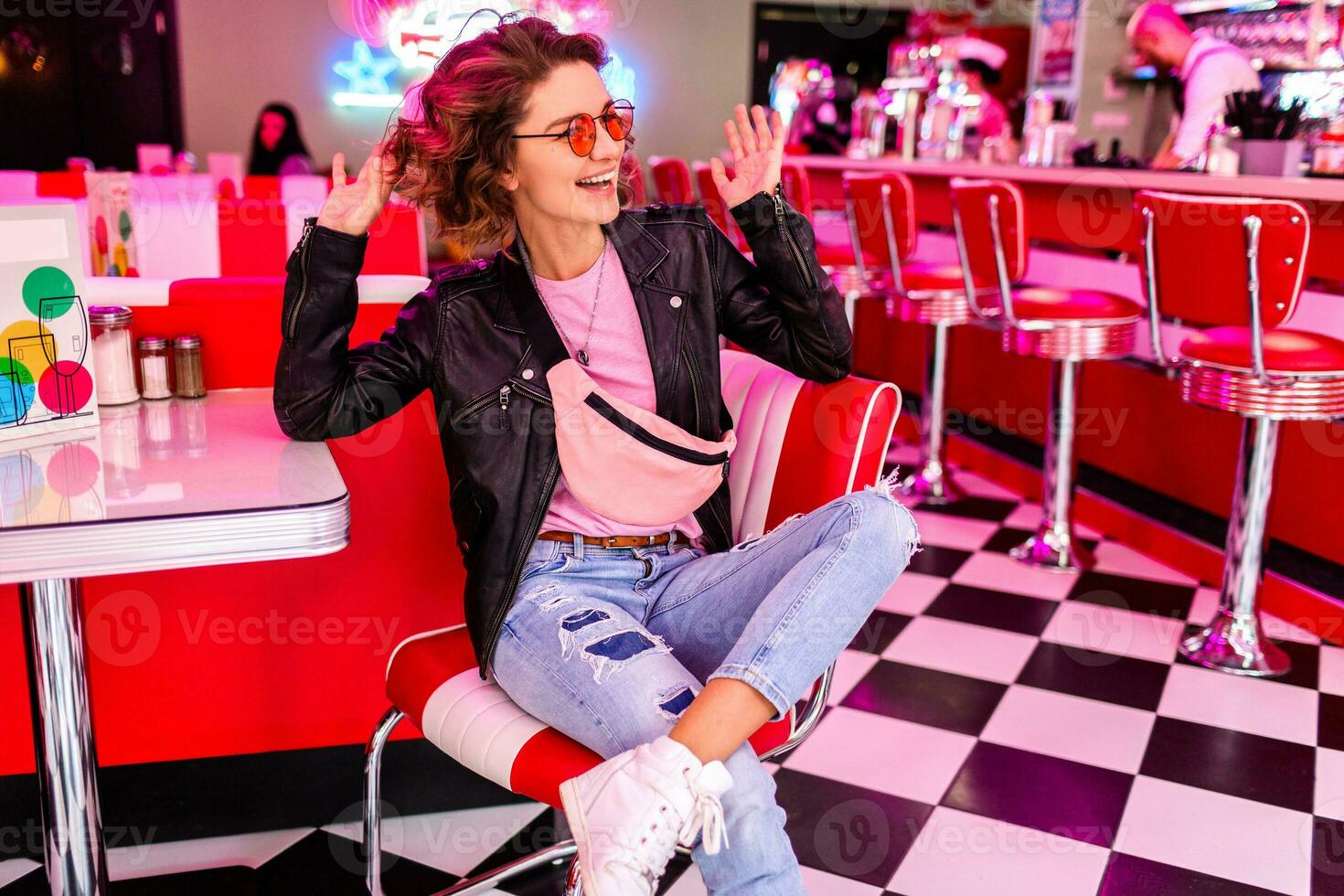 stylish smiling woman in retro vintage cafe photo