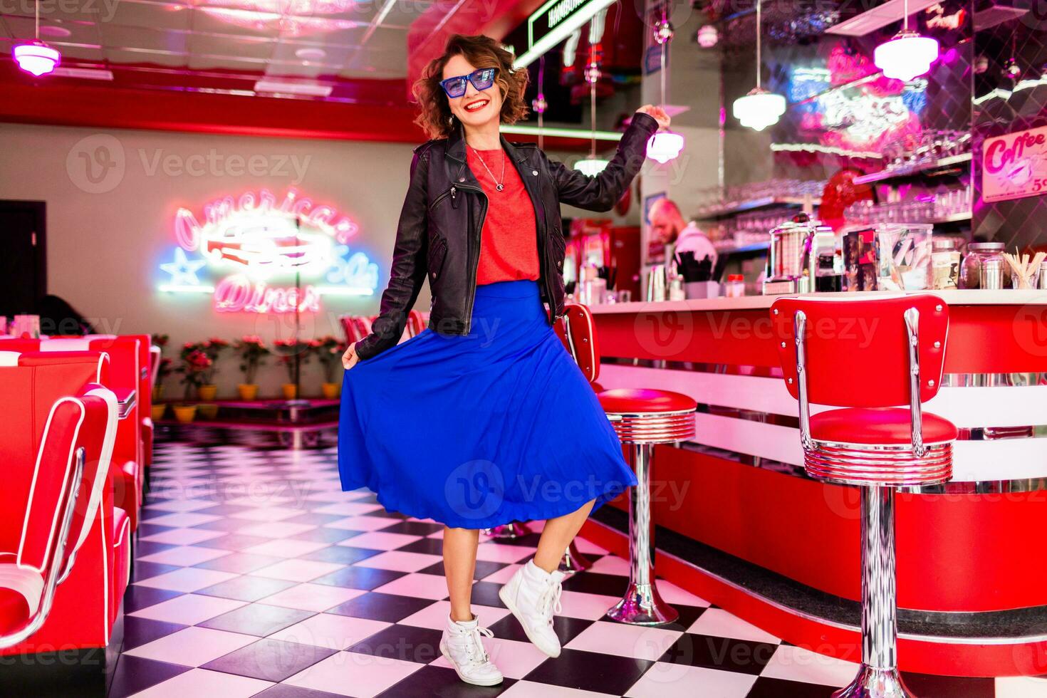 stylish smiling woman in retro vintage cafe photo