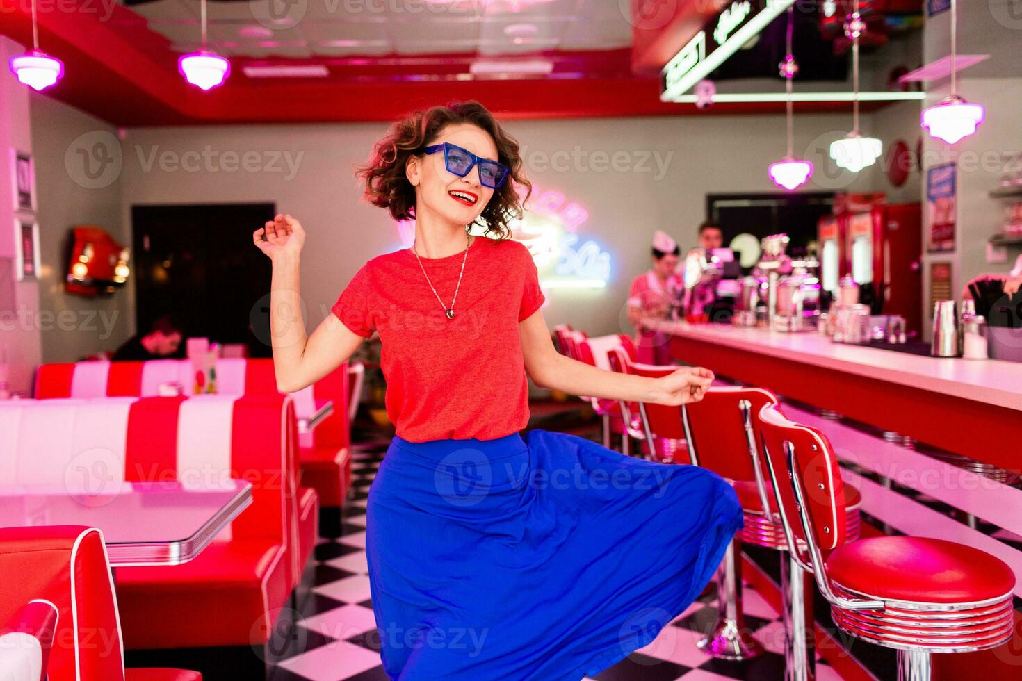 stylish smiling woman in retro vintage cafe photo