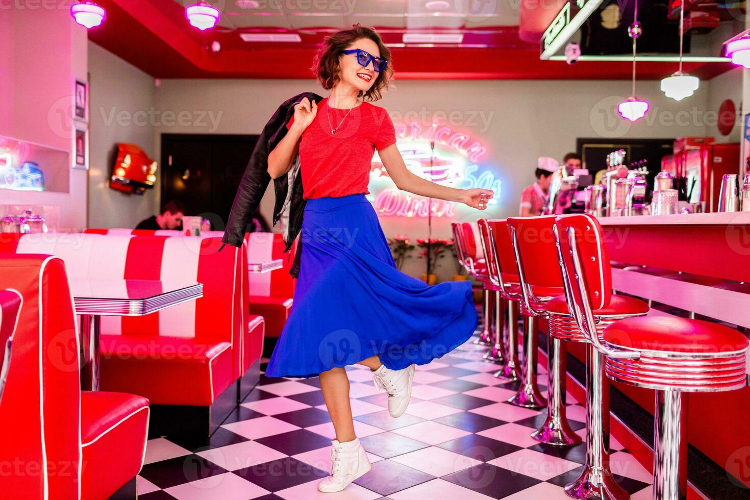 stylish smiling woman in retro vintage cafe photo