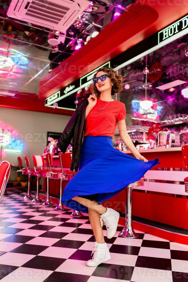 stylish smiling woman in retro vintage cafe photo