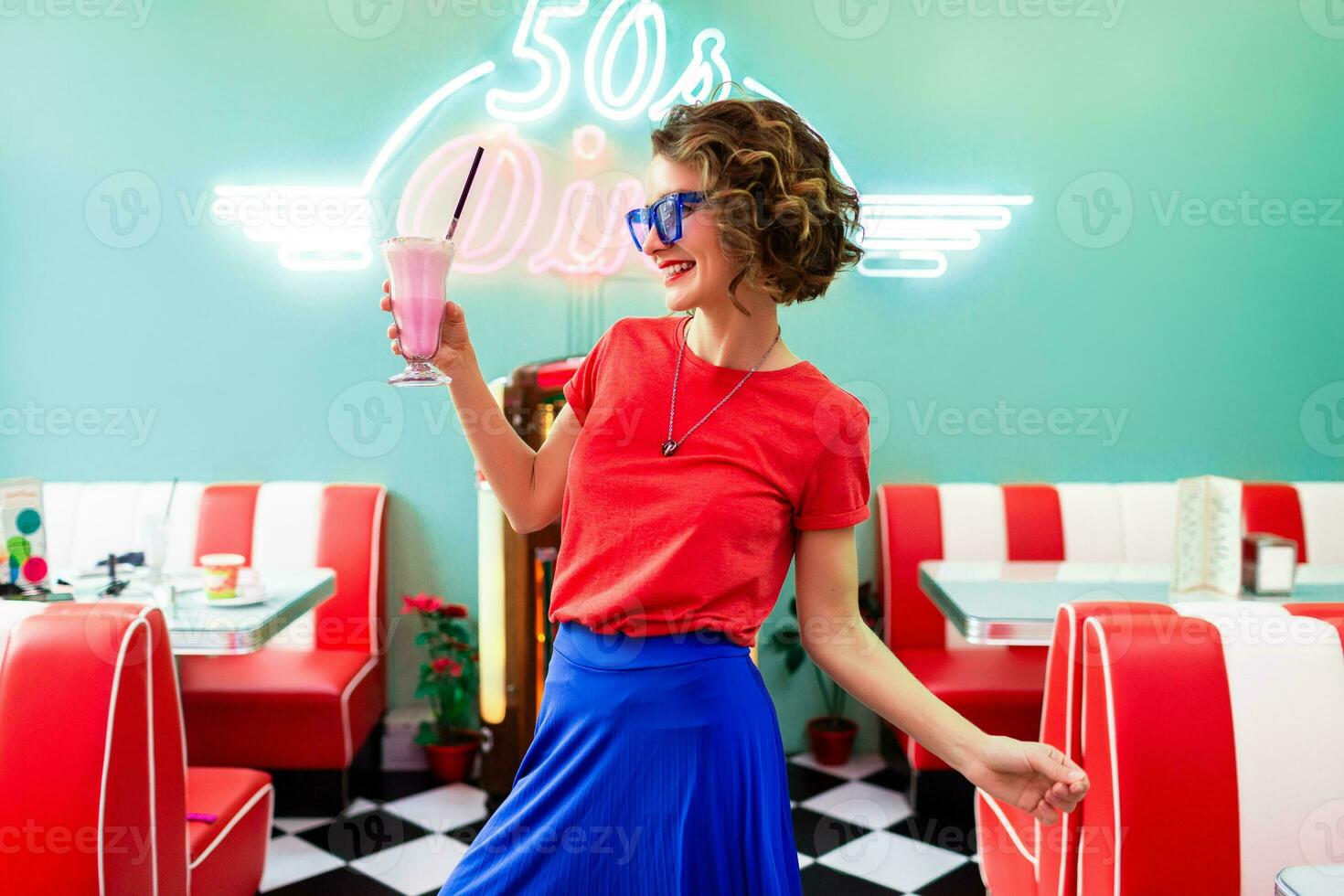 stylish smiling woman in retro vintage cafe photo