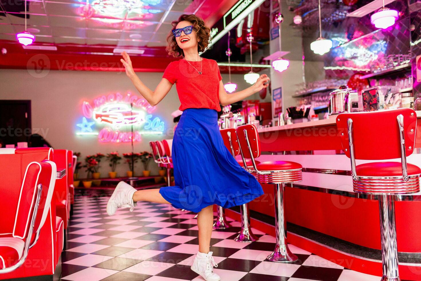 stylish smiling woman in retro vintage cafe photo