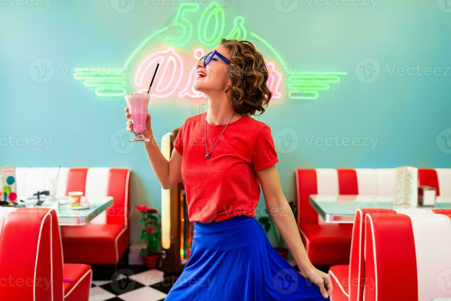 stylish smiling woman in retro vintage cafe photo