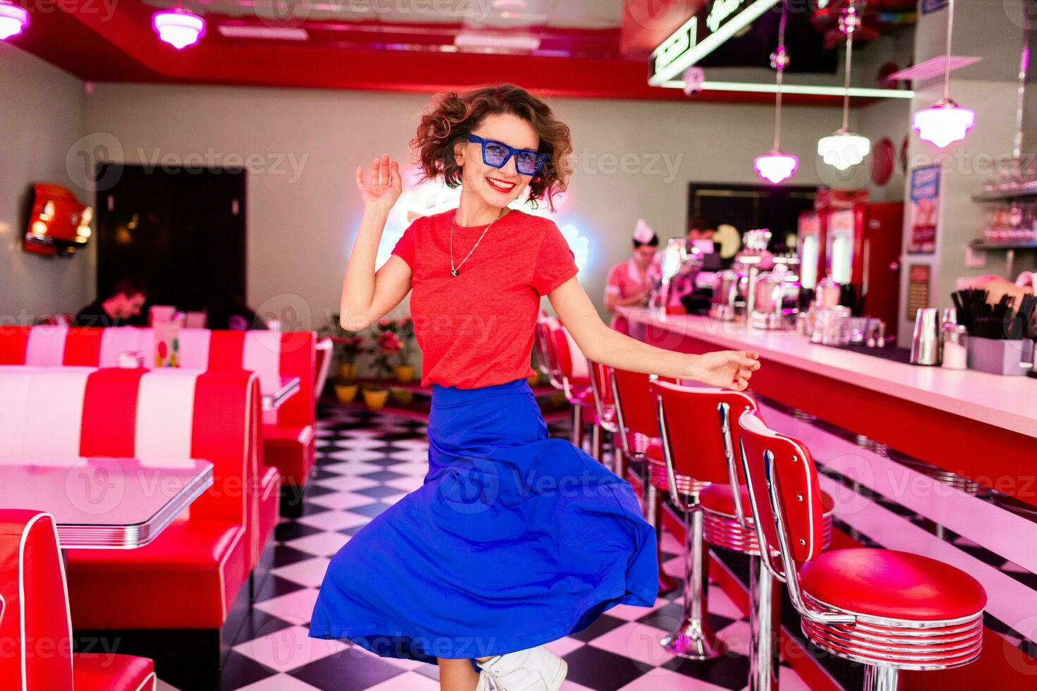 stylish smiling woman in retro vintage cafe photo